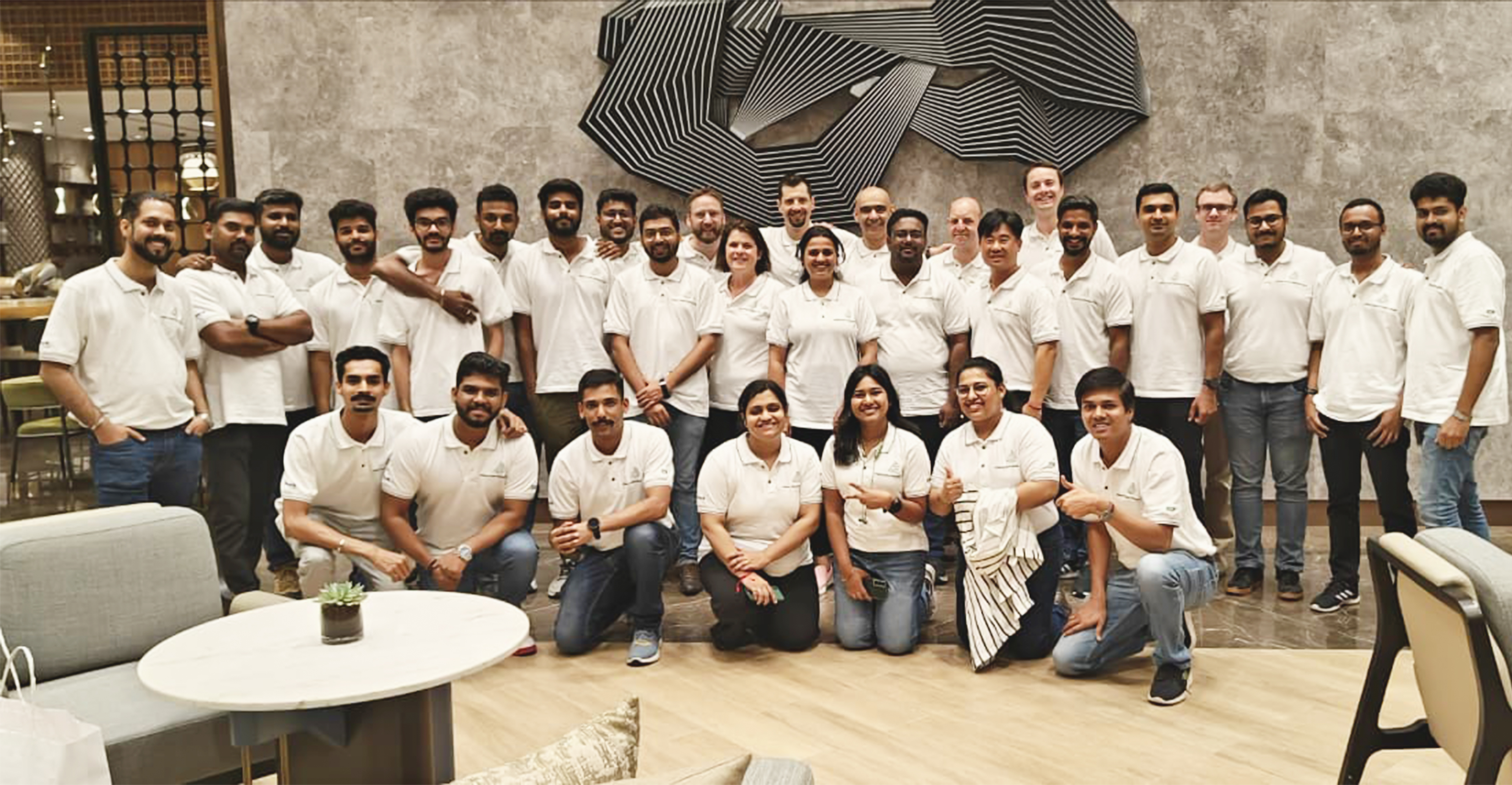 Corporate meeting room with people discussing